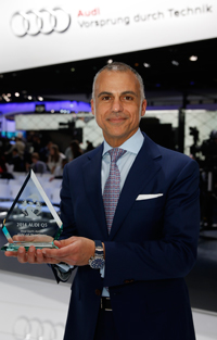 Mark Del Rosso, Audi EVP & COO accepts award for Audi Q5 - Most Earth Aware SUV of the Year for 2014